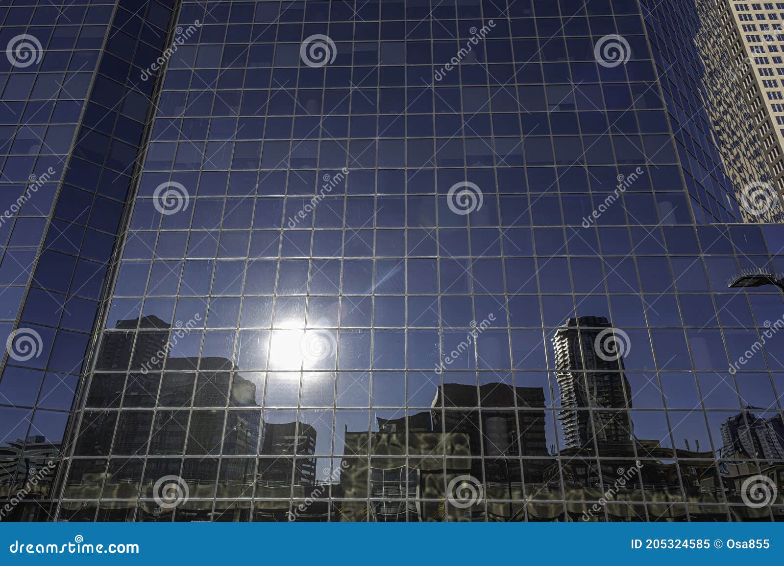 Downtown Calgary Skyline Reflected in Office Tower Glass Wall Editorial
