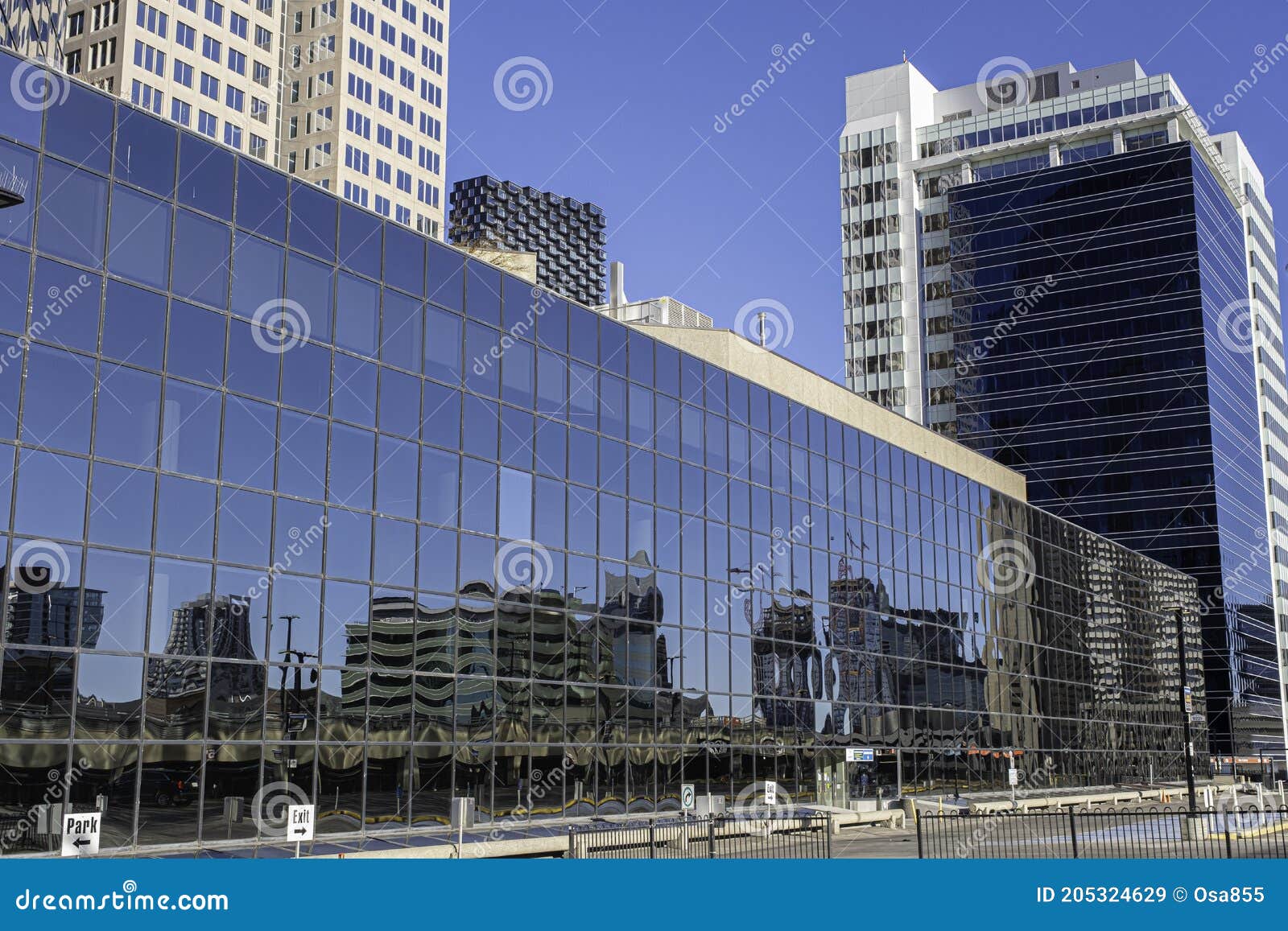 Downtown Calgary Skyline Reflected in Office Tower Glass Wall Editorial
