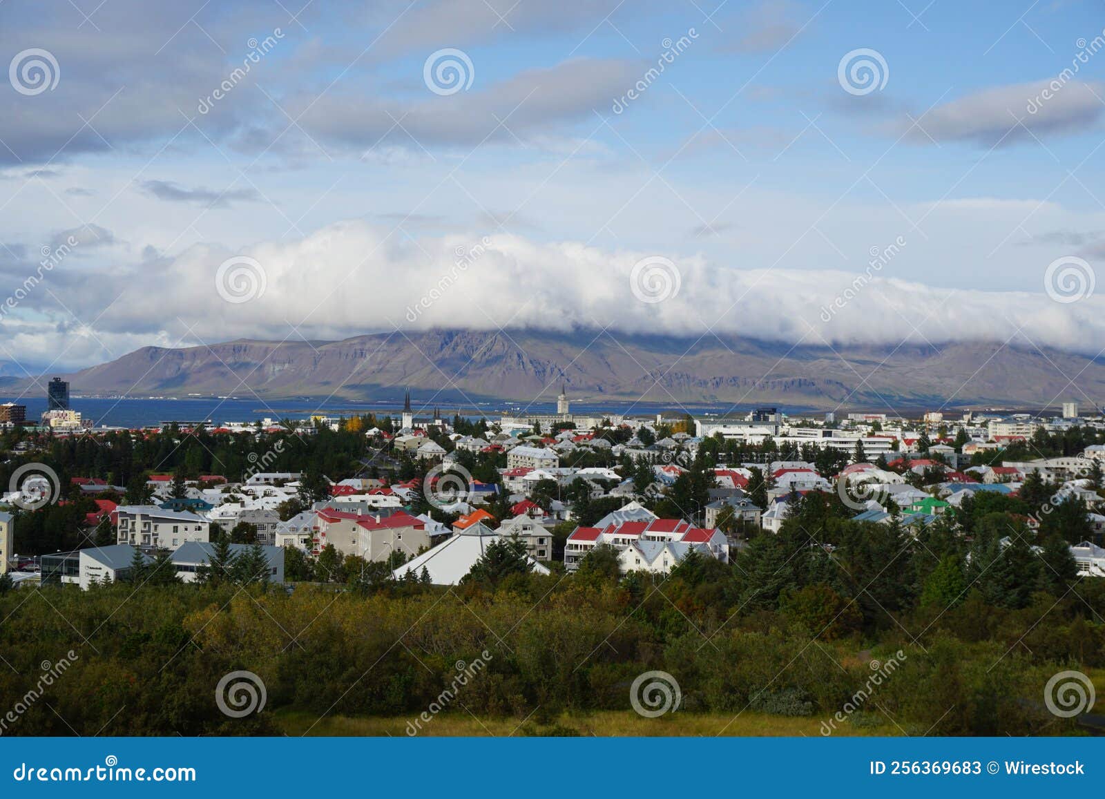 Downtown Reykjavik With Mountains And Clouds In The Background Iceland