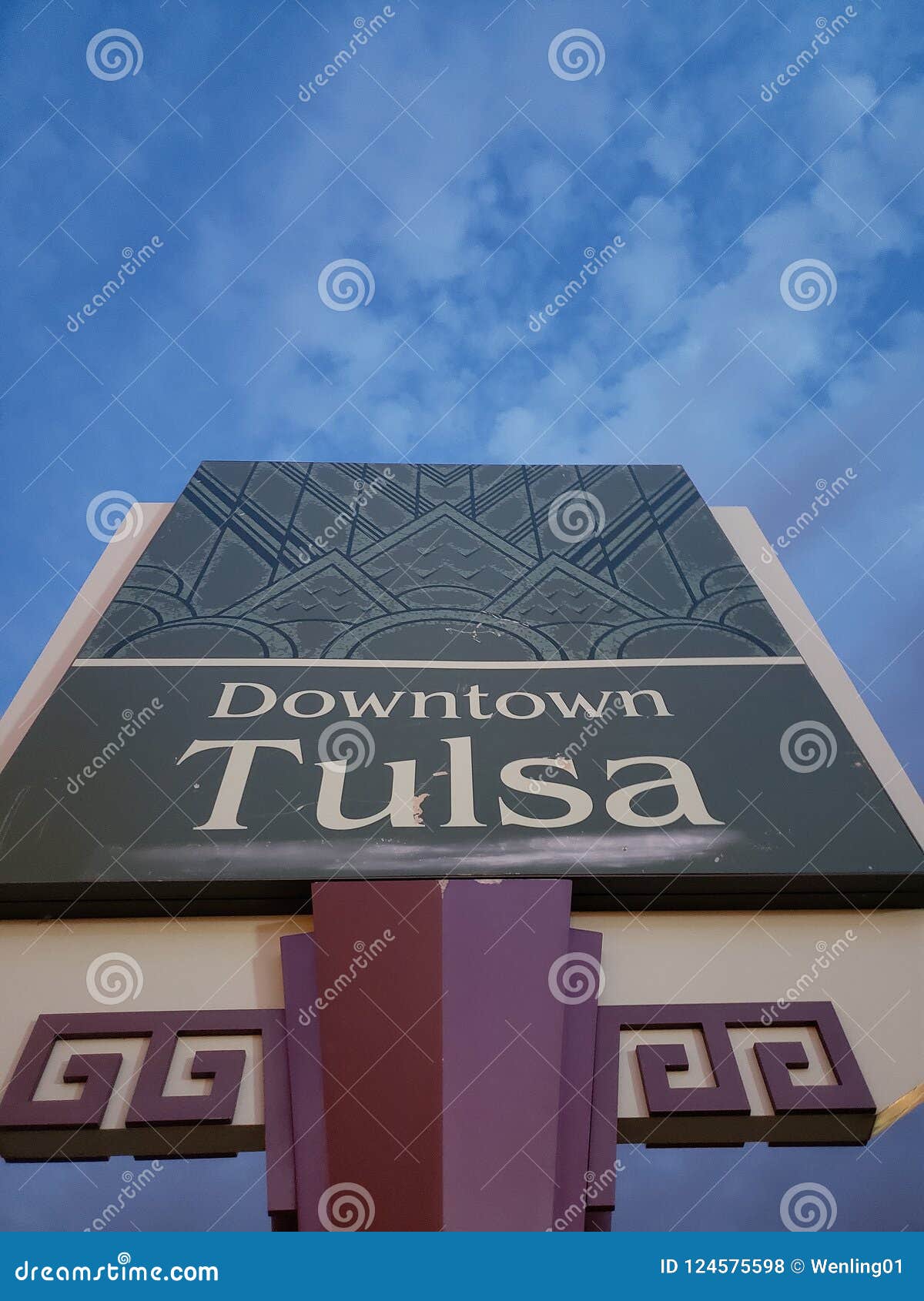 Tulsa USA Sign Pointing Toward Tulsa Downtown Attractions With BOK