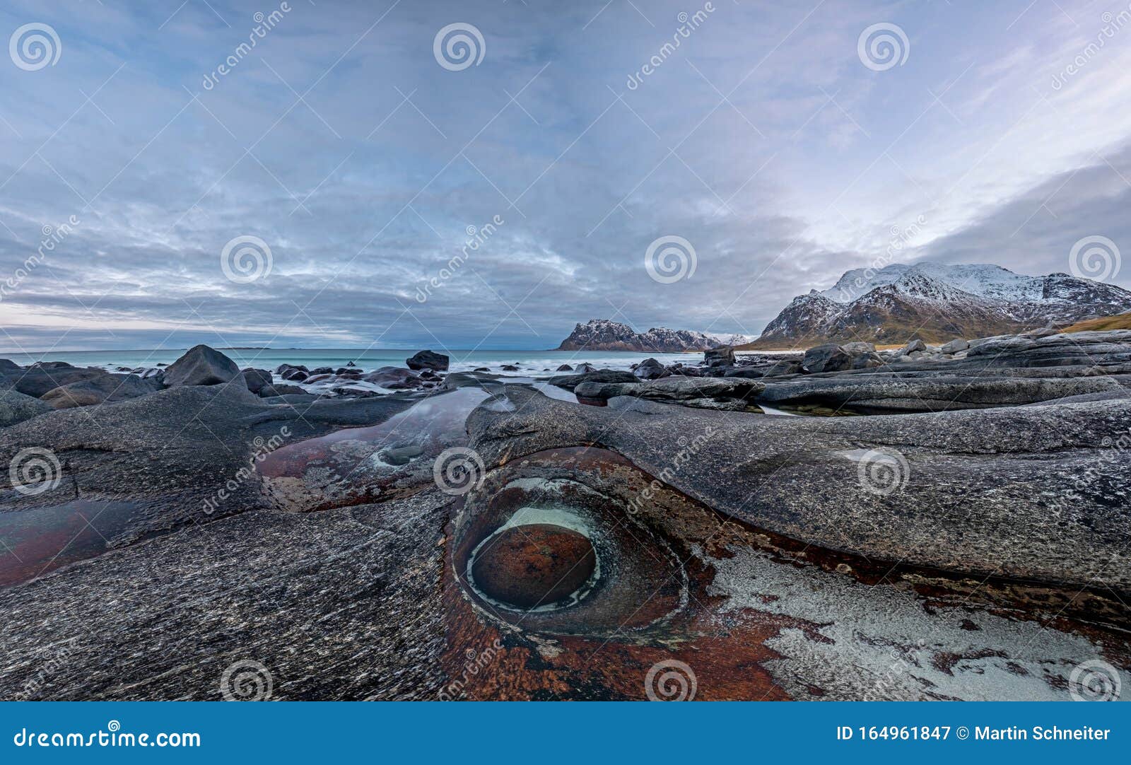The Dragons Eye Is A Unique Natural Rock Formation At Uttakleiv Beach ...