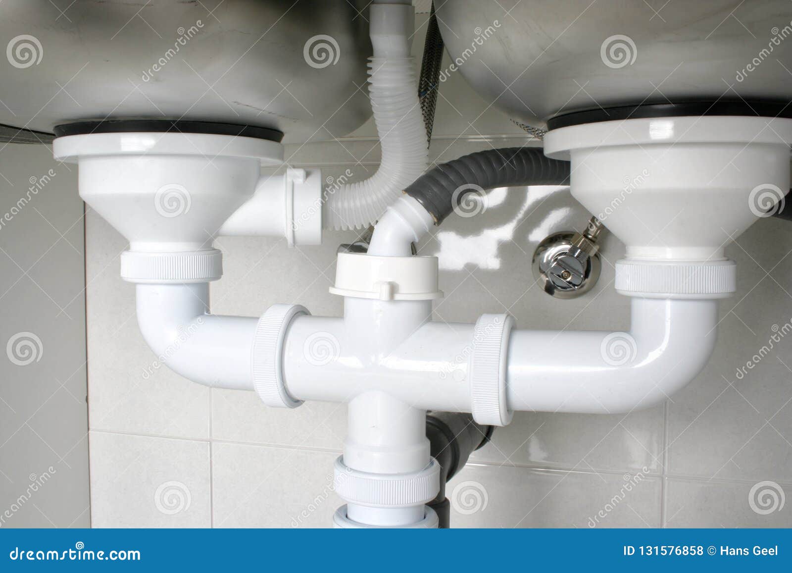 Drain Pipes Of A Kitchen Sink With Dishwasher Connection