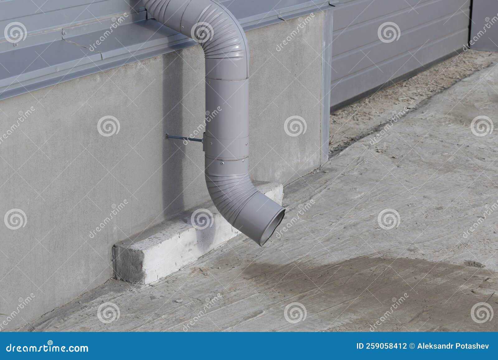 A Drain from the Roof.a Pipe for Draining Water from the Roof of the