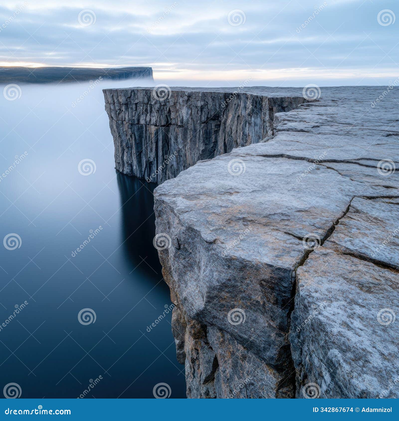 dramatic cliff edge overlooking serene ocean