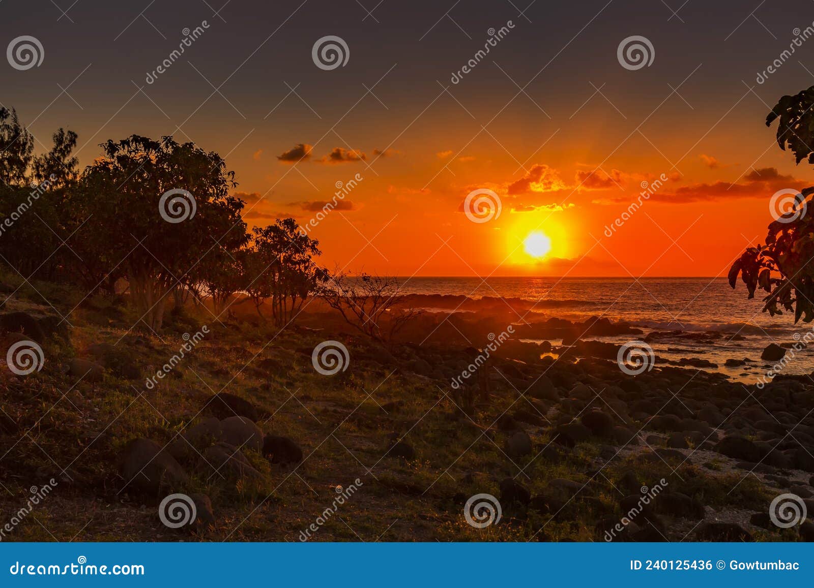 Beautiful sunset with dramatic cloud. Dramatic cloud at sunset on the public beach of Albion in the west of the republic of Mauritius.