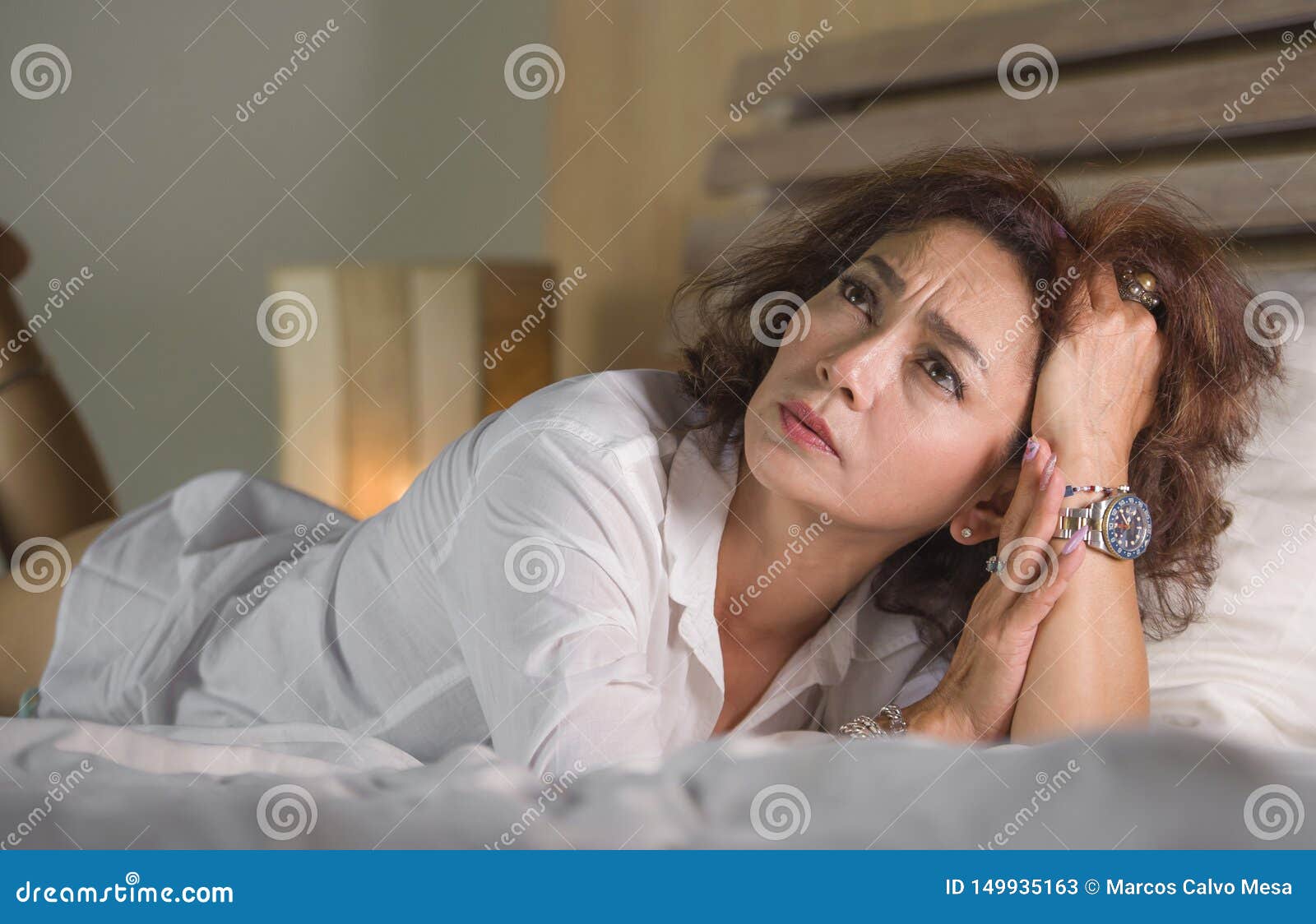 Dramatic Lifestyle Portrait Of Attractive Sad And Depressed Middle Aged Around 50s Woman Feeling 