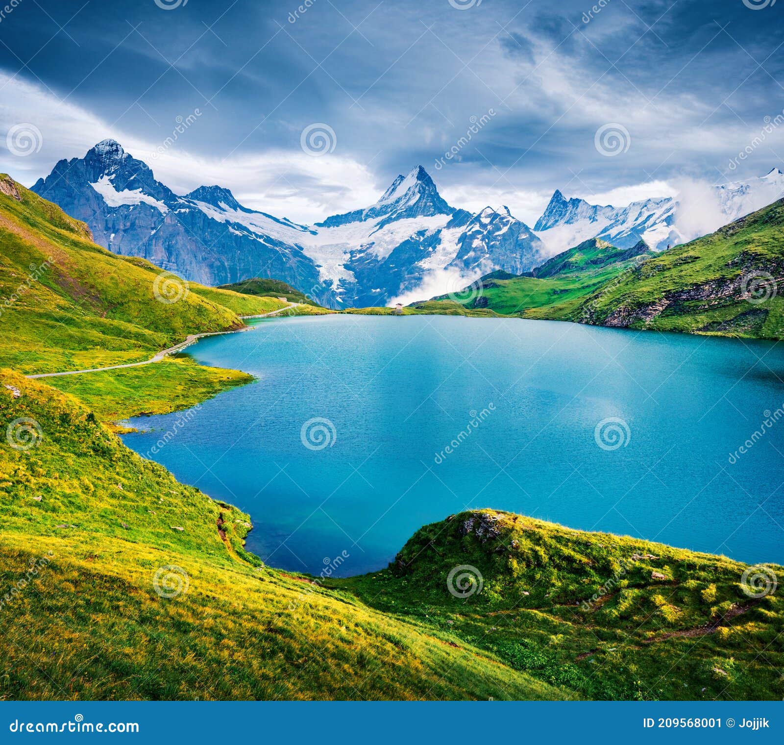 Dramatic Summer View Of The Bachalpsee Lake With Schreckhorn Peak On