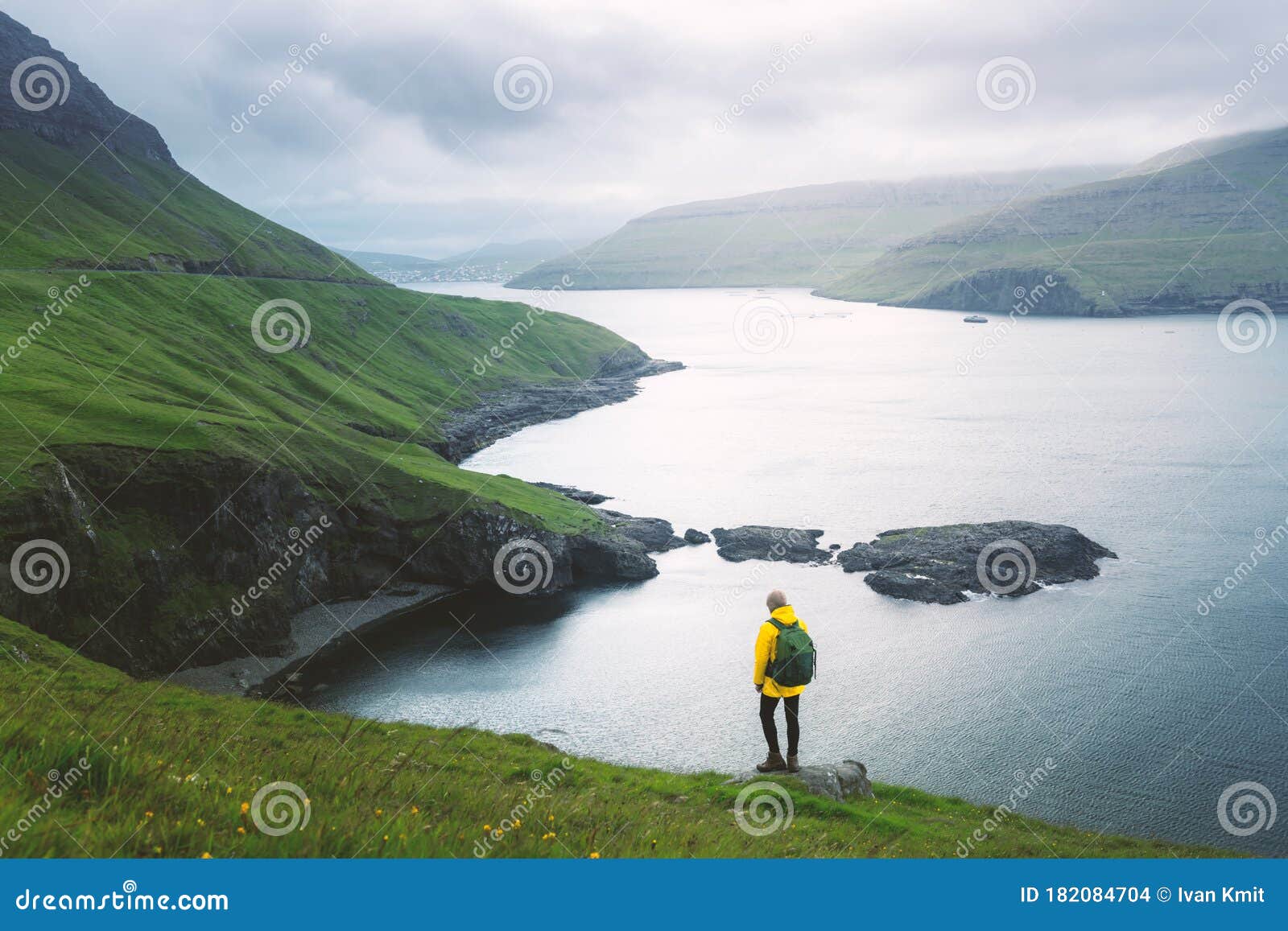 dramatic view of green hills of vagar island and sorvagur town