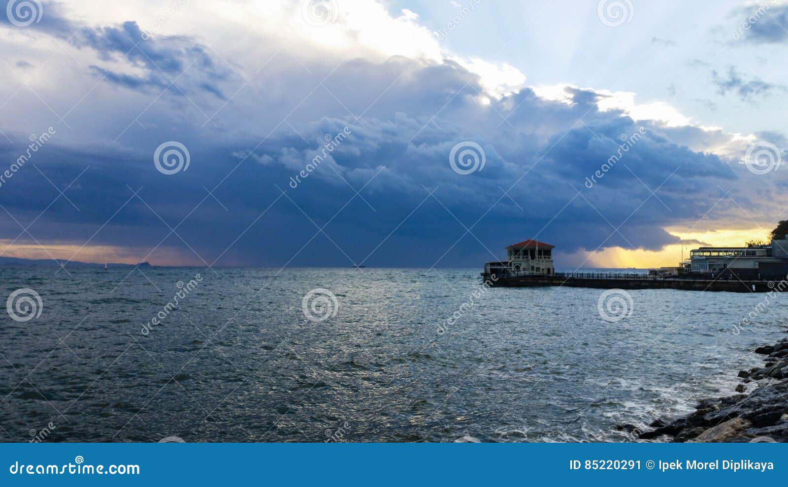 dramatic view of the sea and the pier in moda, istanbul city