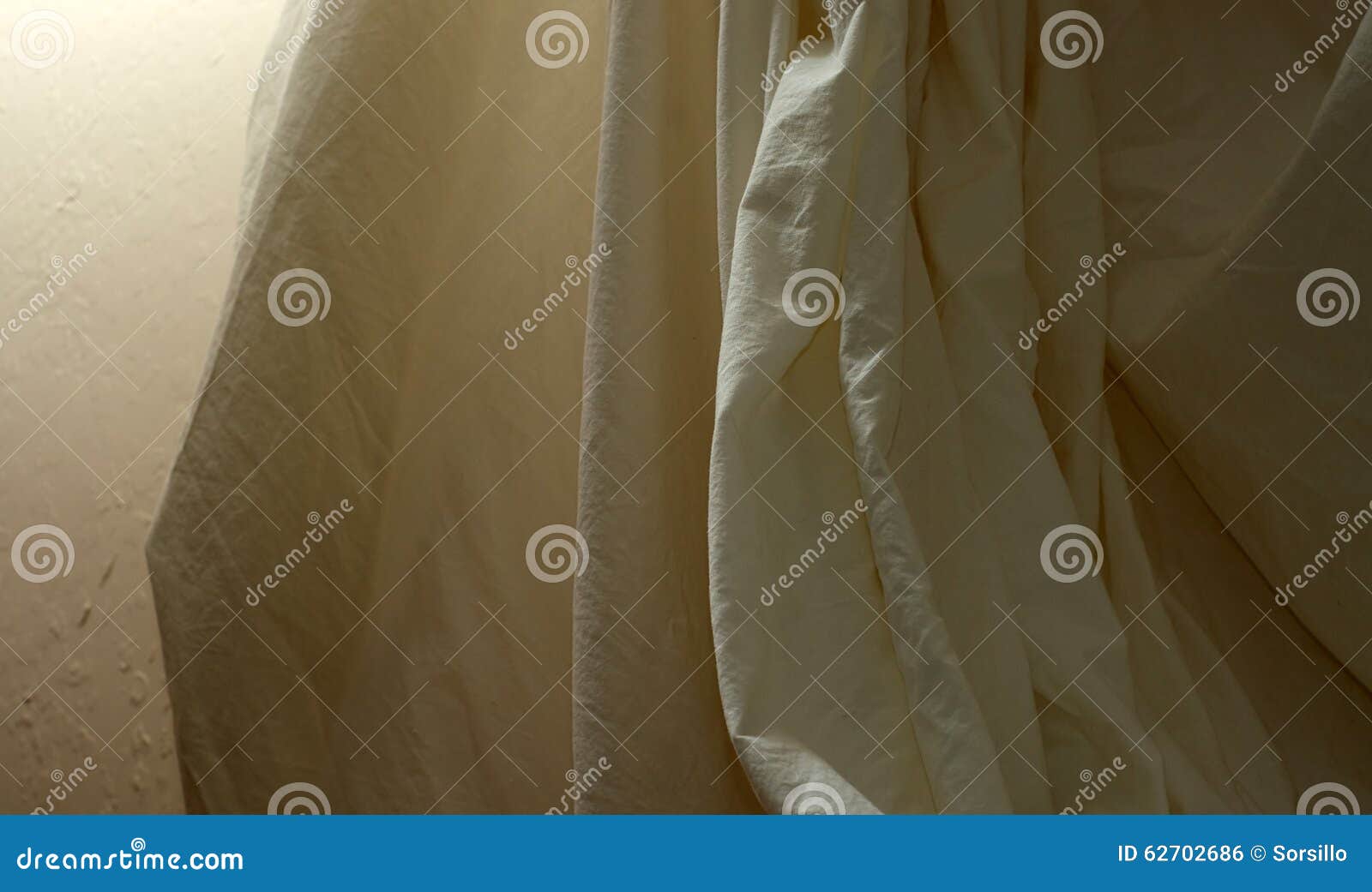 draped muslin background cloth with wall