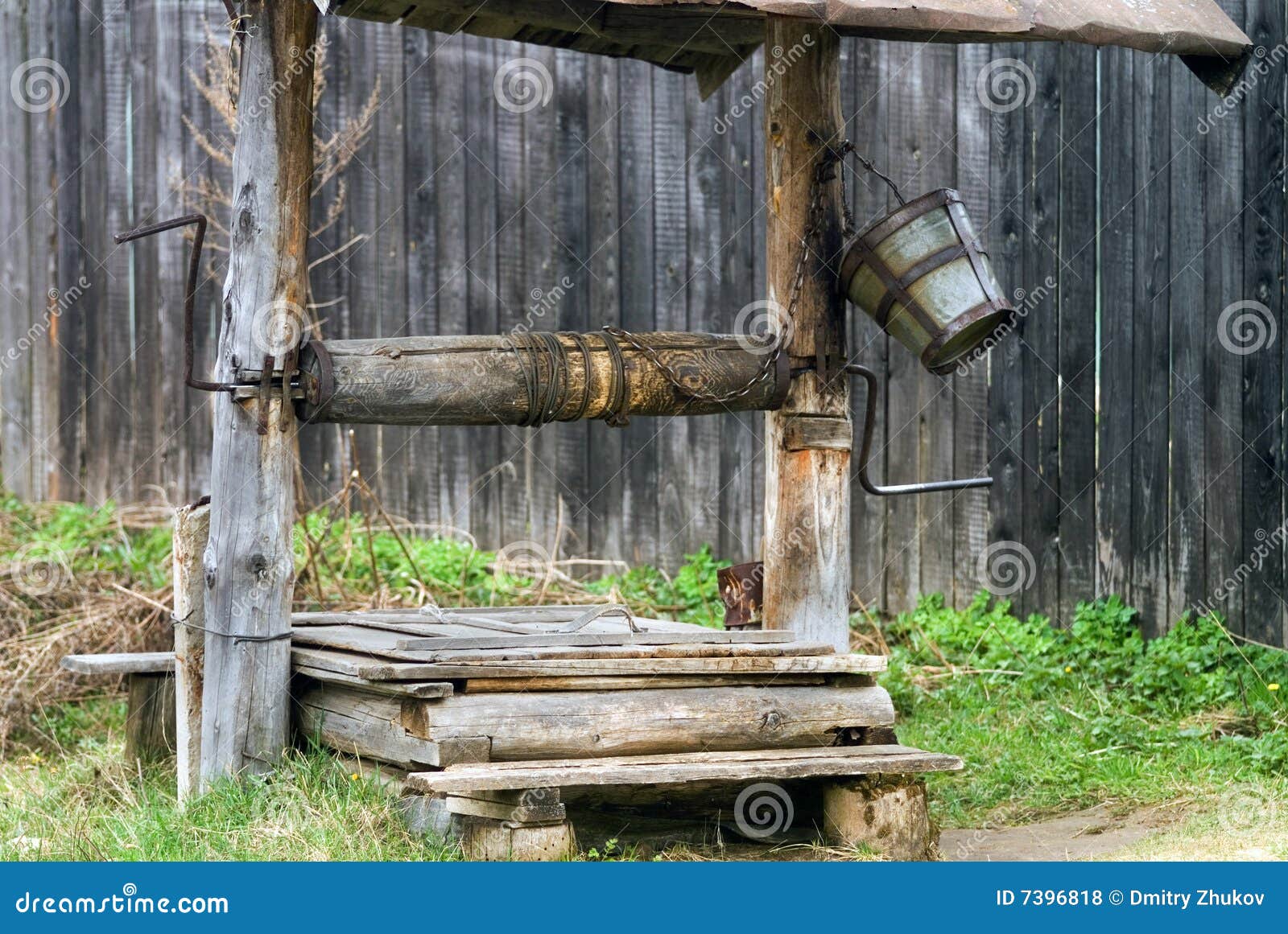 Drawwell with bucket stock photo. Image of windlass, village 7396818