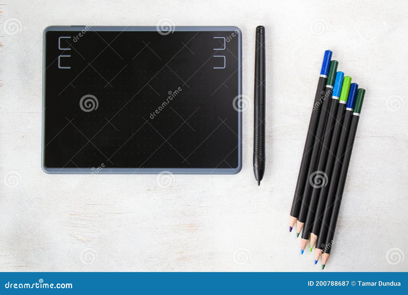 Drawing and Painting Tablet and Styles Pen and Pencils on the White