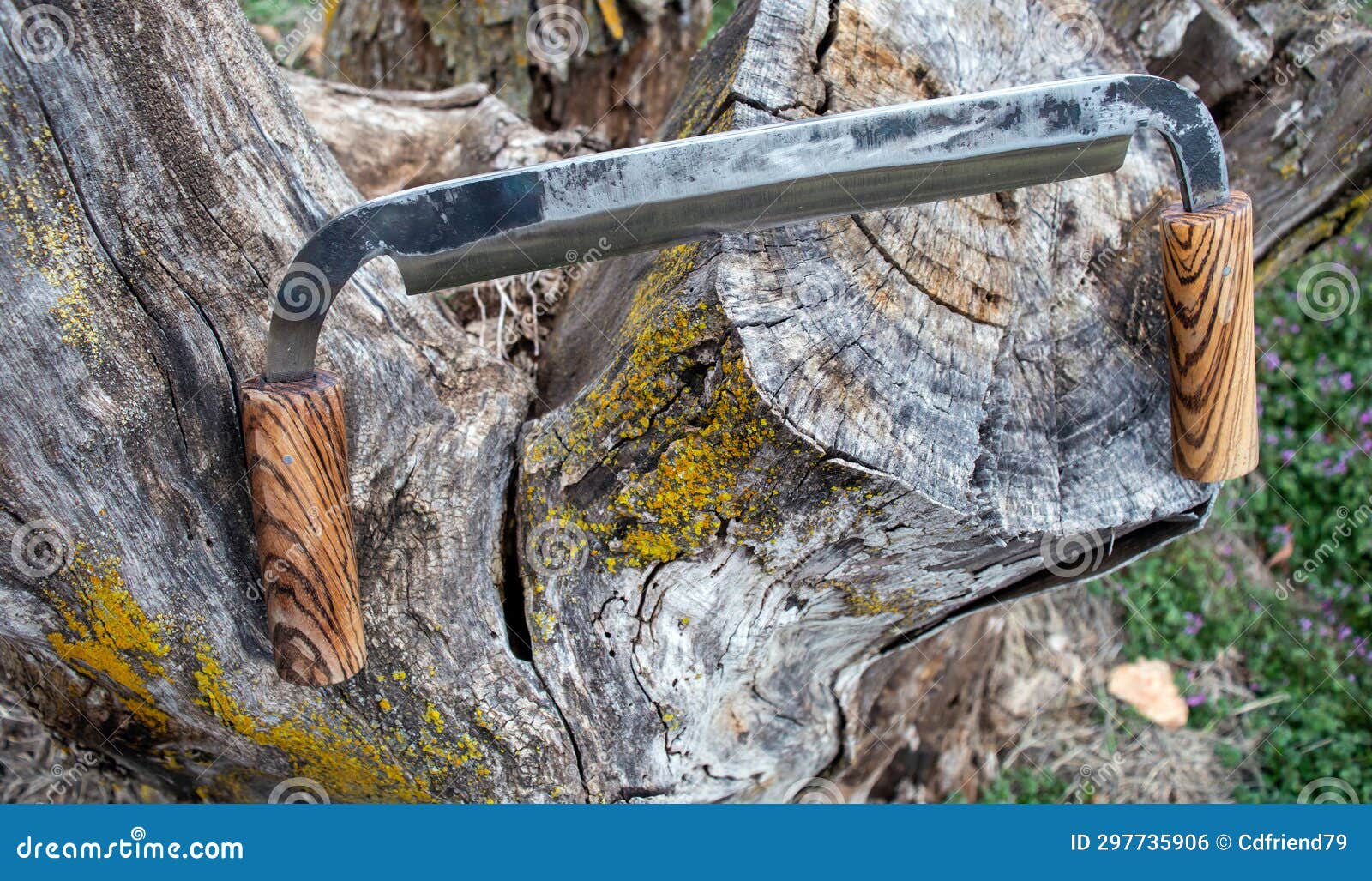 drawknife on a tree stump
