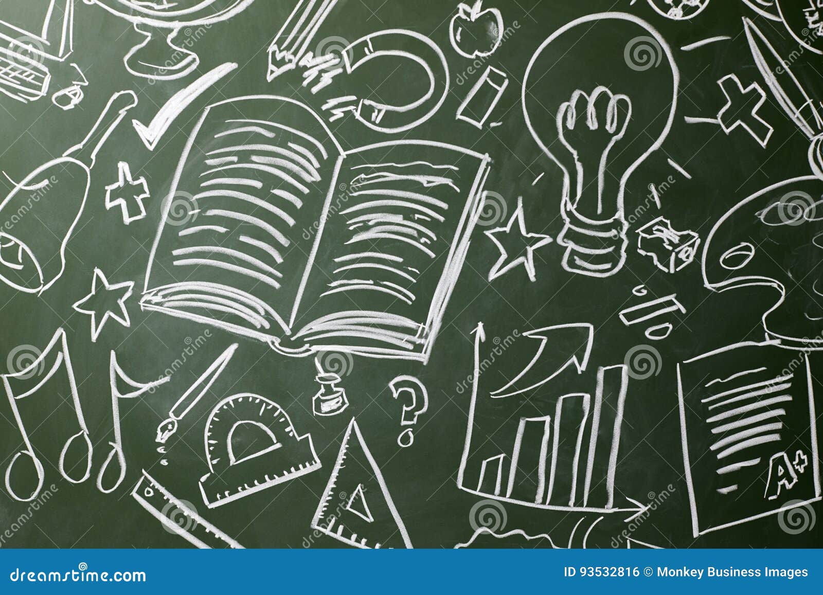 Drawn Symbols of School Subjects on a Chalkboard, Close Up Stock Photo