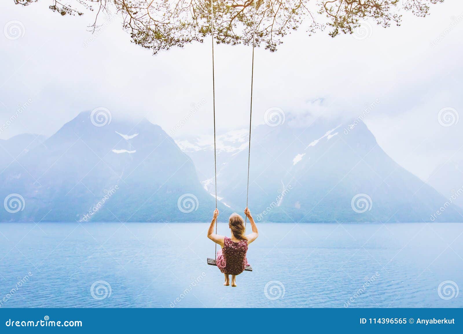 dream concept, beautiful young woman on the swing