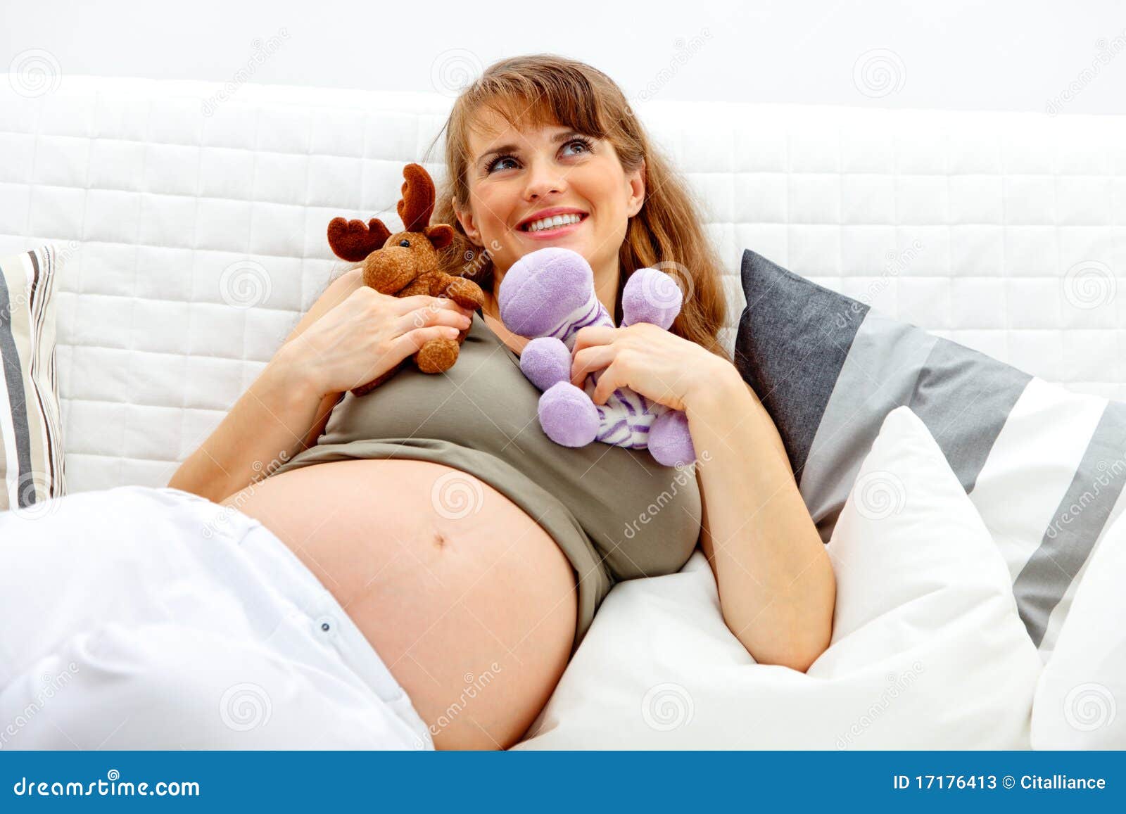 Dreaming Pregnant Woman Lying On Sofa With Toys Stock Image Image