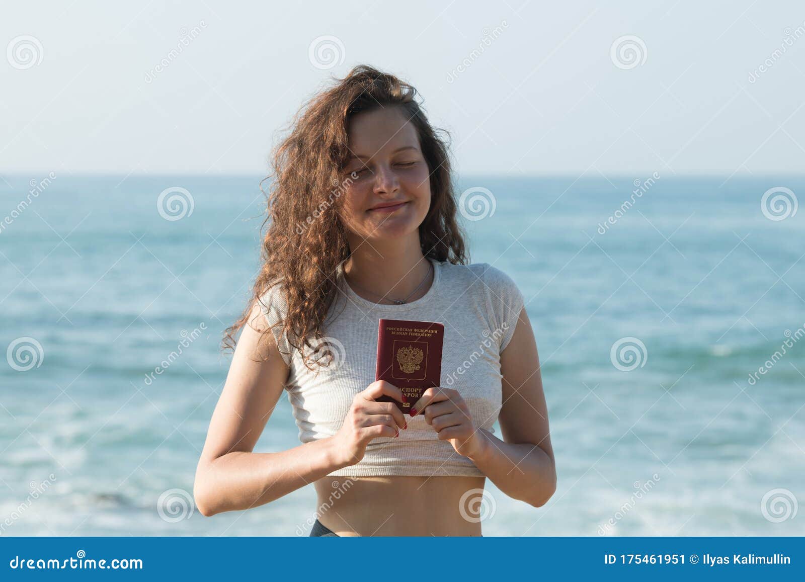 Dreaming About Vacations Russian Girl Holding Russian Passport Enjoying Vacation Against Sea