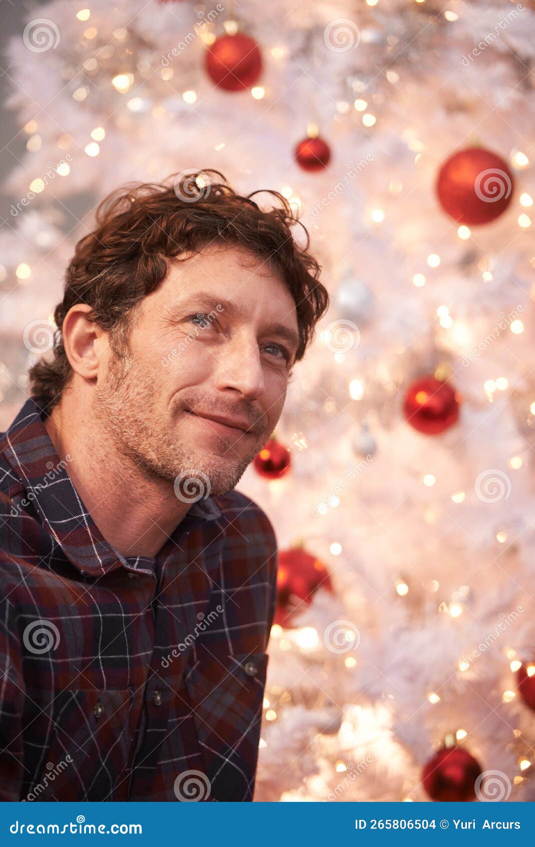 Dreaming of a White Christmas. a Handsome Man in Front of a White