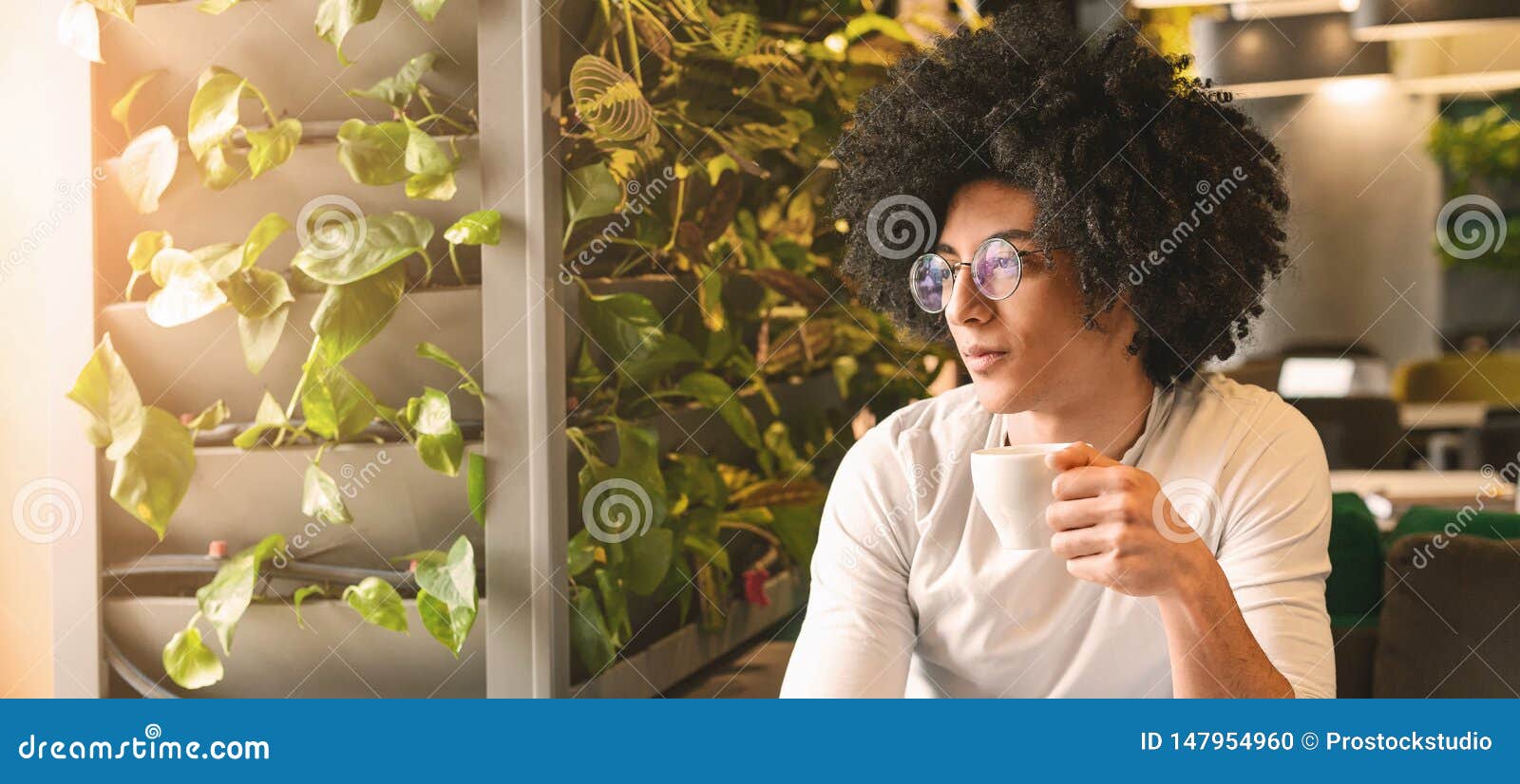 Dreamy Black Millennial Guy Drinking Coffee In Cafeteria Stock Photo Image Of Morning Cafe 147954960