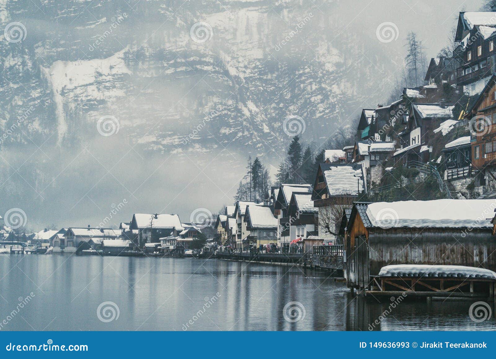 Dreamy European Village on a Lake Covered by Fog and Romantic and