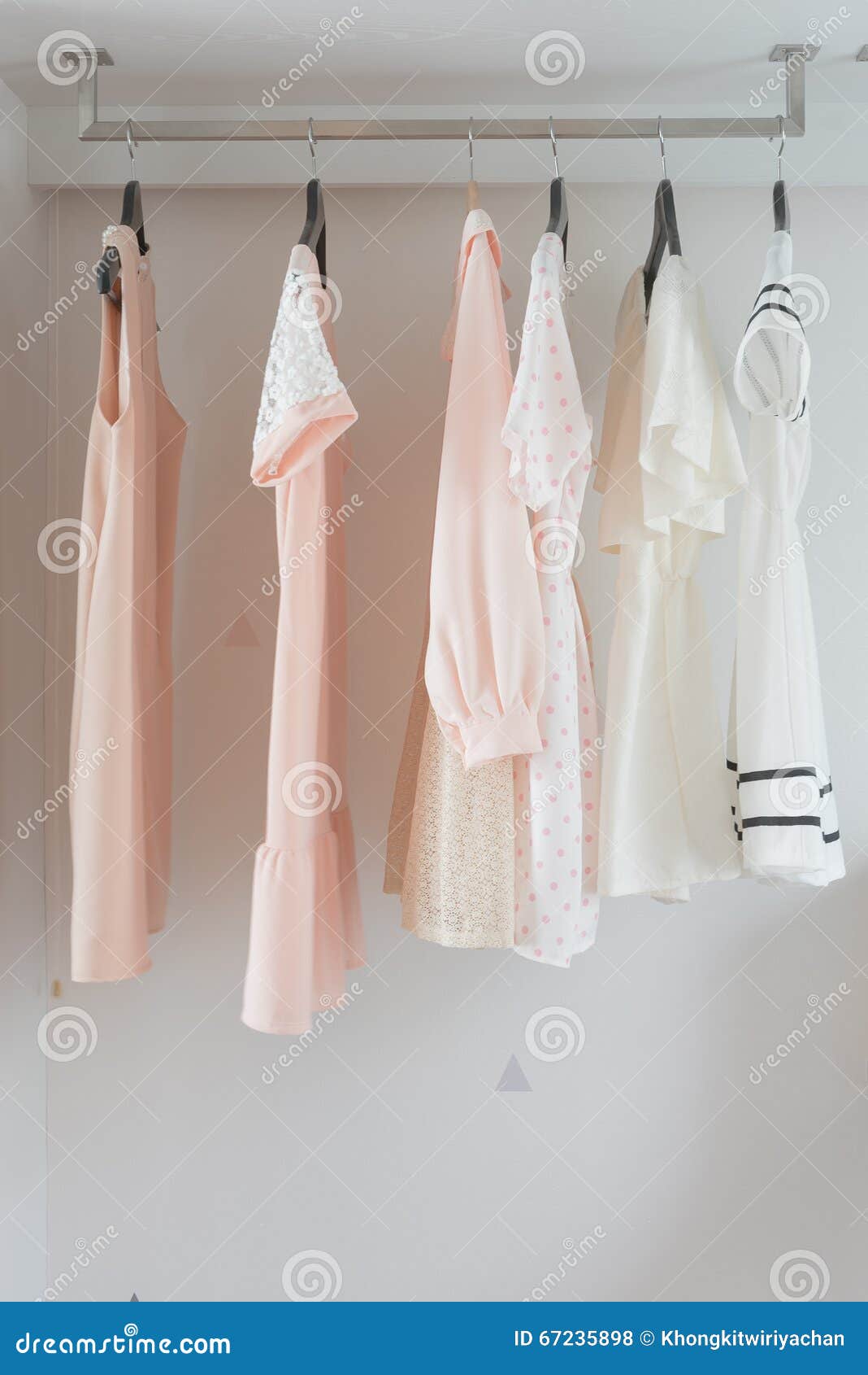 Dress hanging on rail stock photo. Image of style, boxes - 67235898