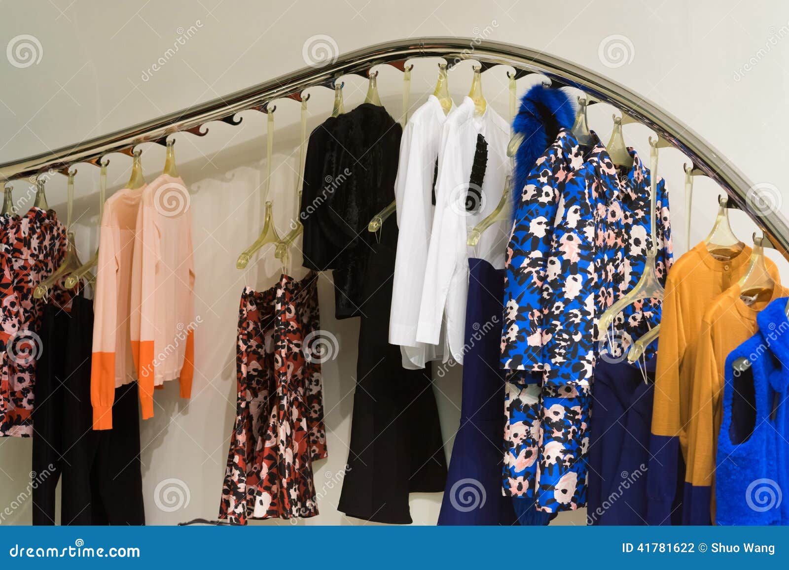 Dresses on hangers stock photo. Image of dress, grey 41781622