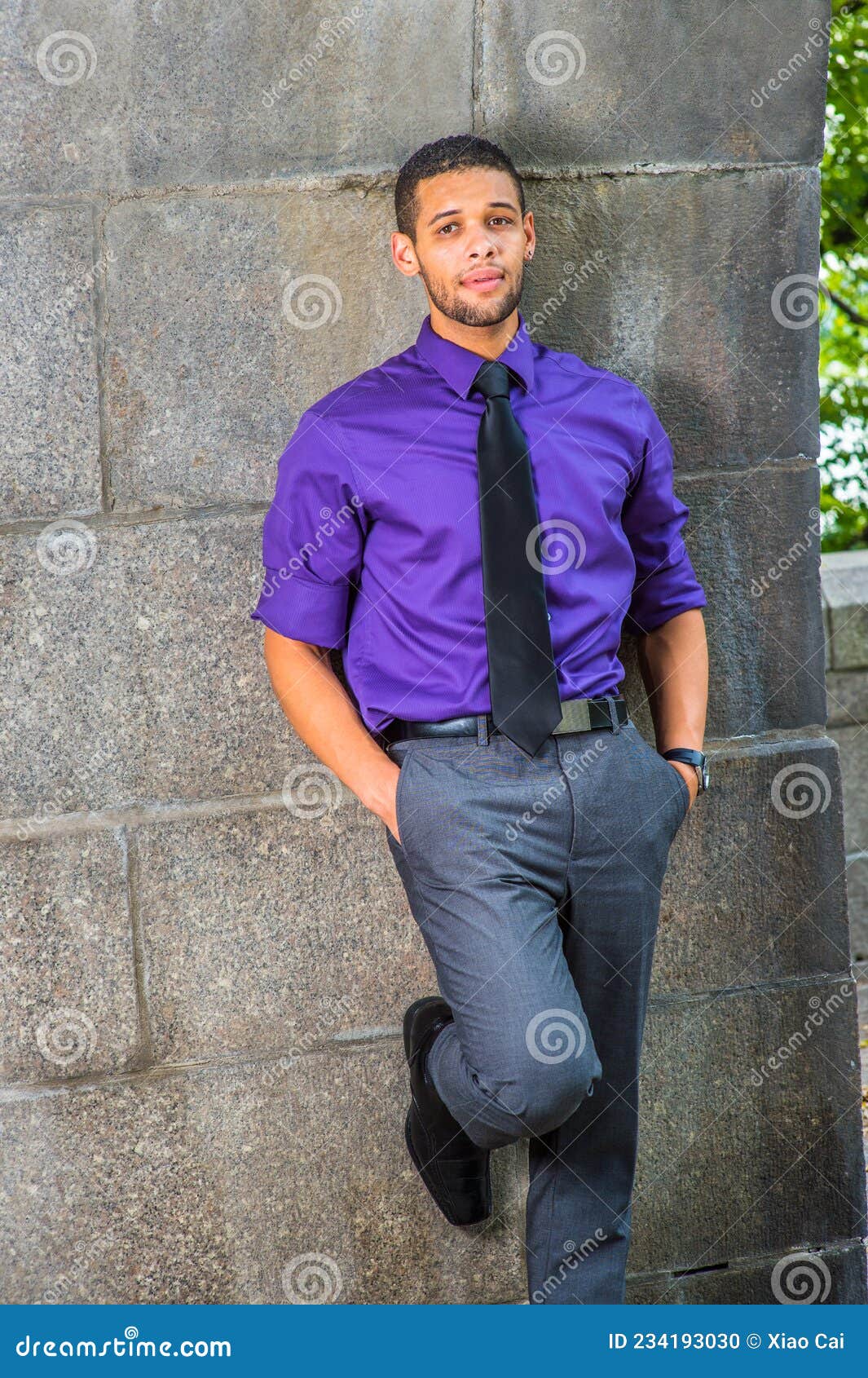 Unidentified Senegalese Man In Purple Shirt And Black Pants Walks Along The  Road In The Street Of Kayar Senegal Stock Photo - Download Image Now -  iStock