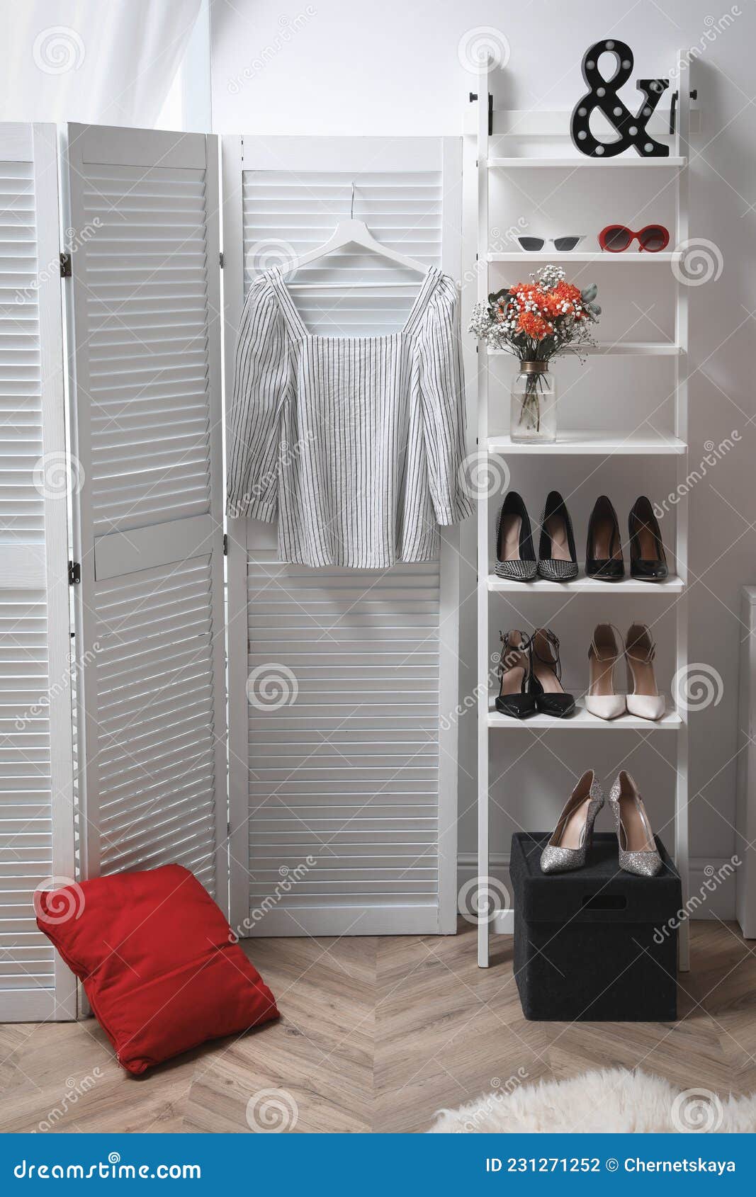 Dressing Room with Folding Screen and Decorative Ladder. Contemporary