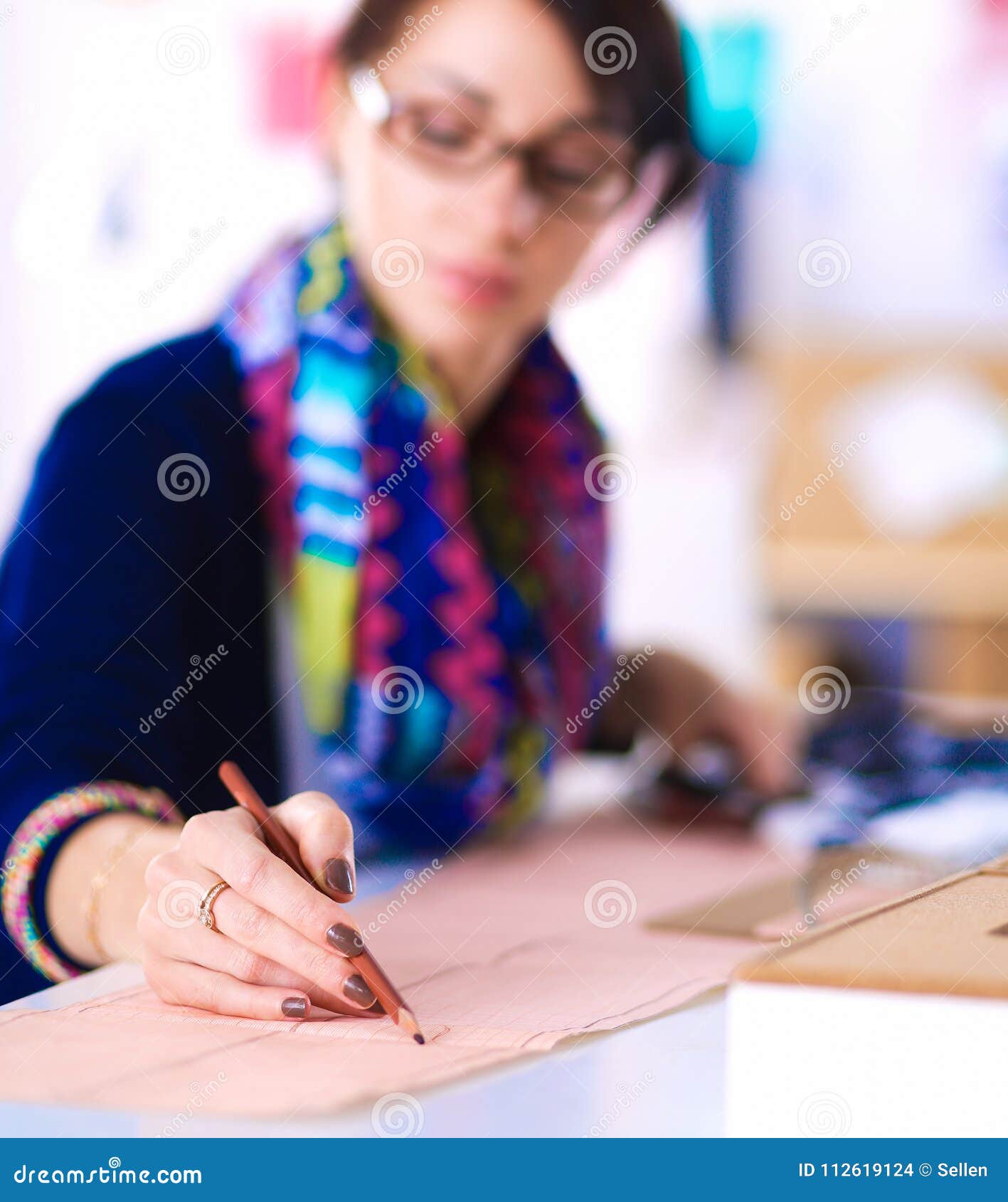 Dressmaker Designing Clothes Pattern on Paper Stock Photo - Image of ...