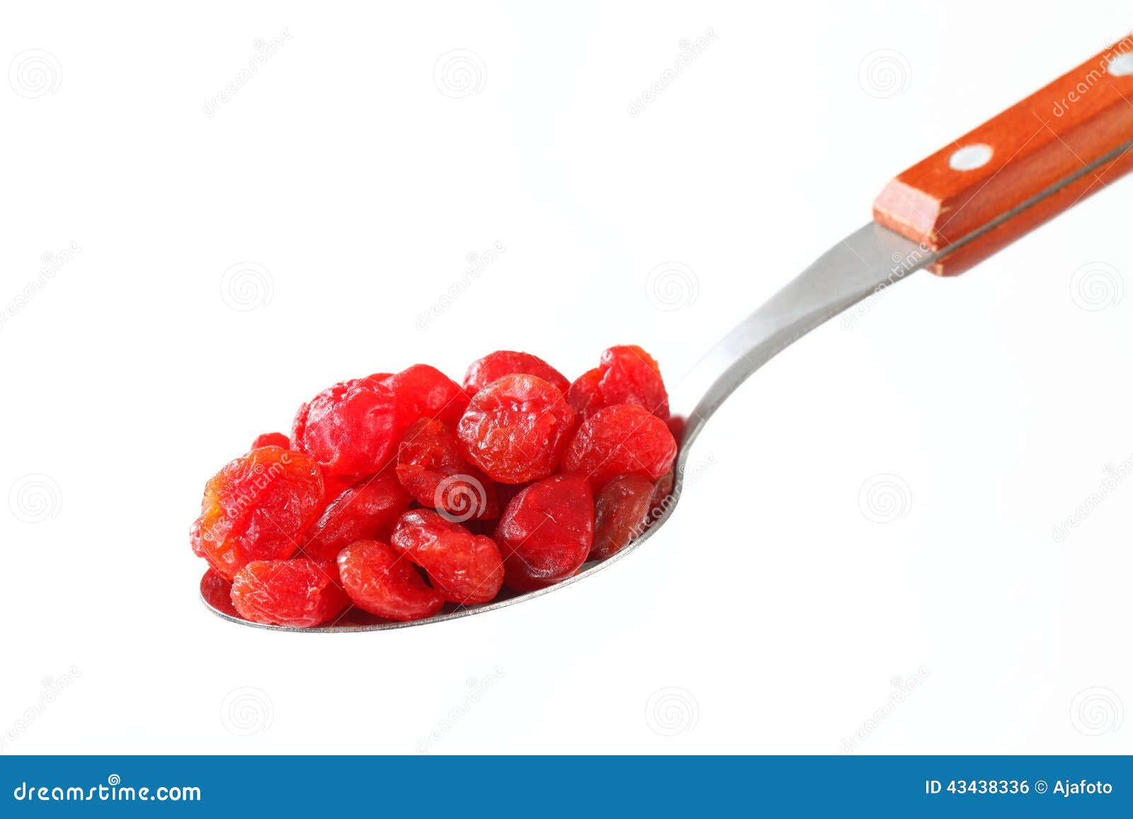 Dried cherries on spoon stock photo. Image of closeup 43438336