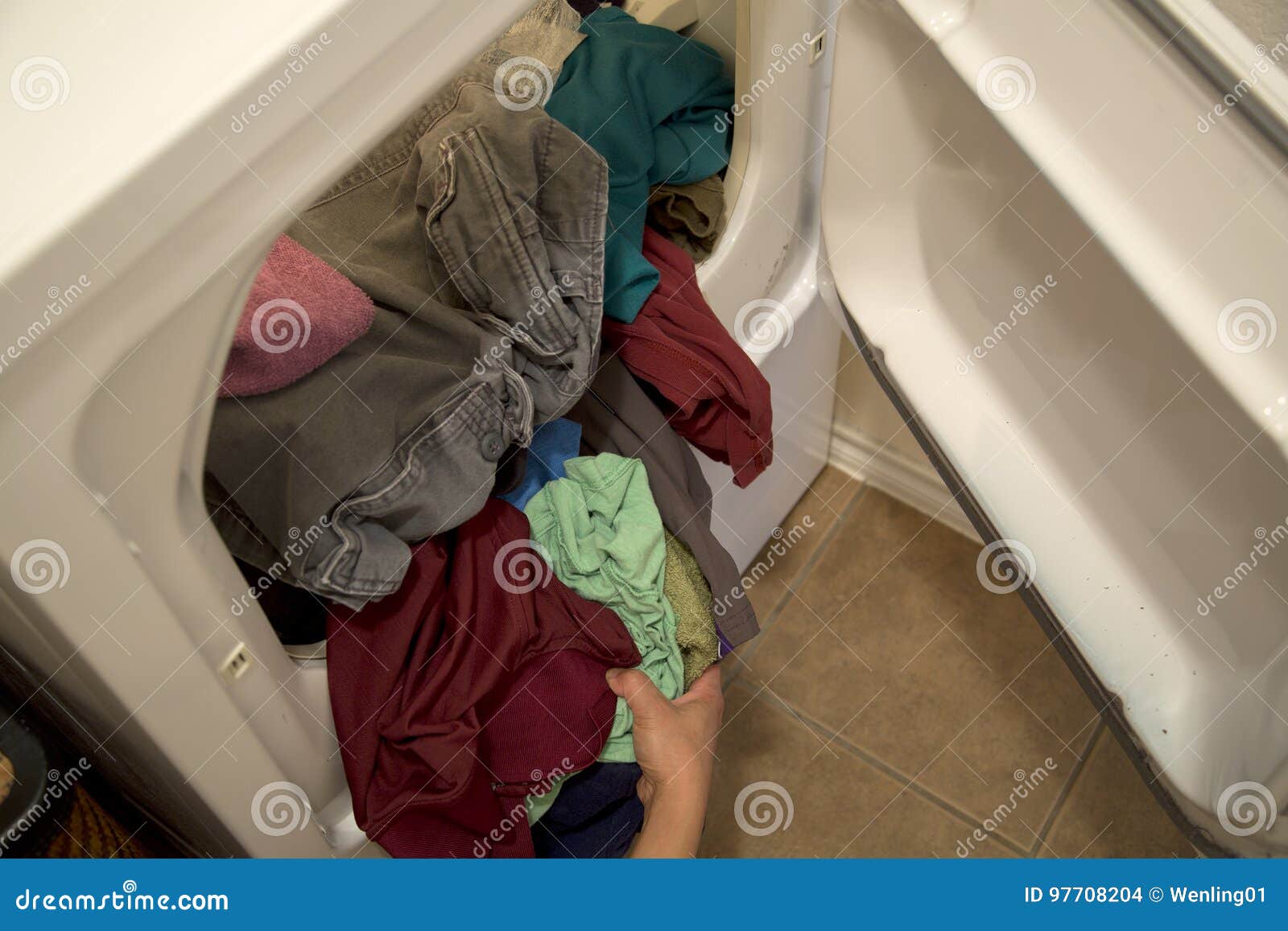 dried clothes in dryer of house