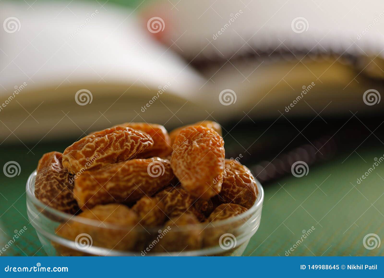 Dried Dates in Bowl. Dried Raw Organic Medjool Date Fruit and Green ...