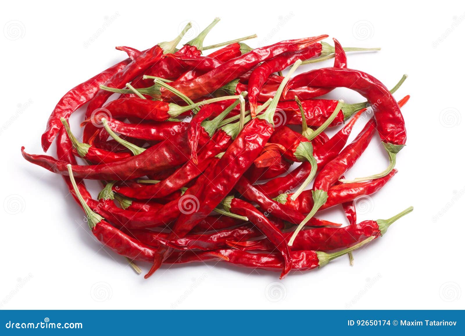 dried de arbol chiles pile, paths, top view