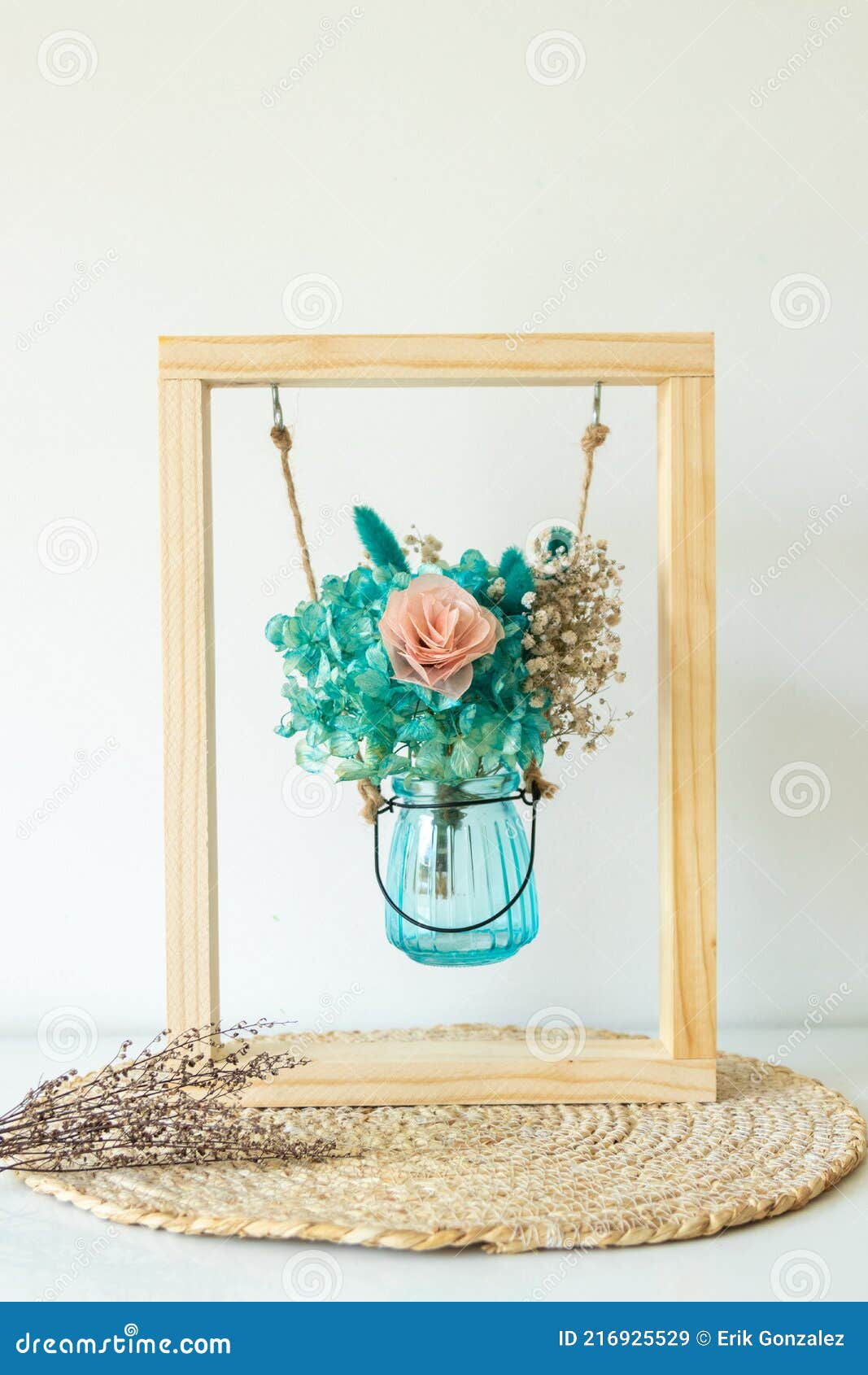 Dried Flowers in Glass Container Inside a Frame Stock Image Image of
