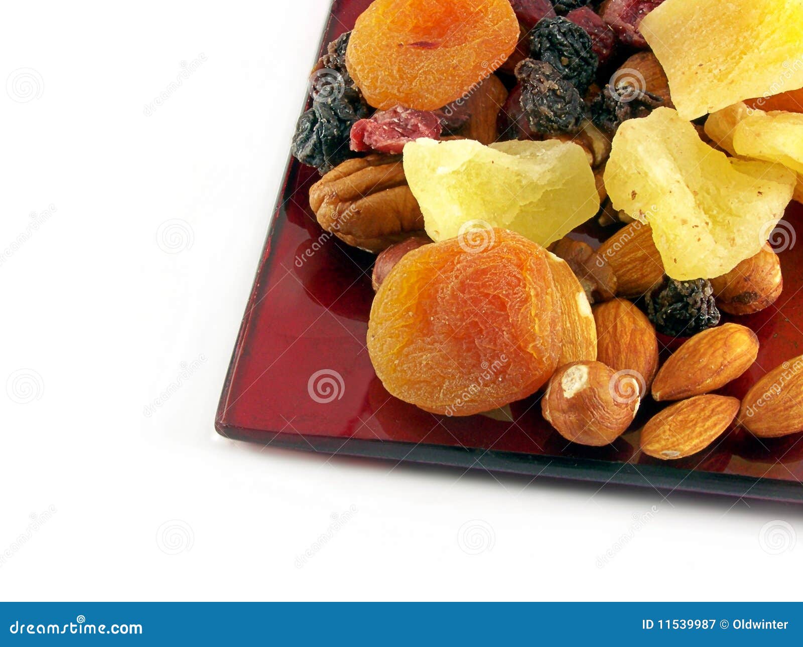 Dried fruit on plate stock image. Image of macadamia 11539987