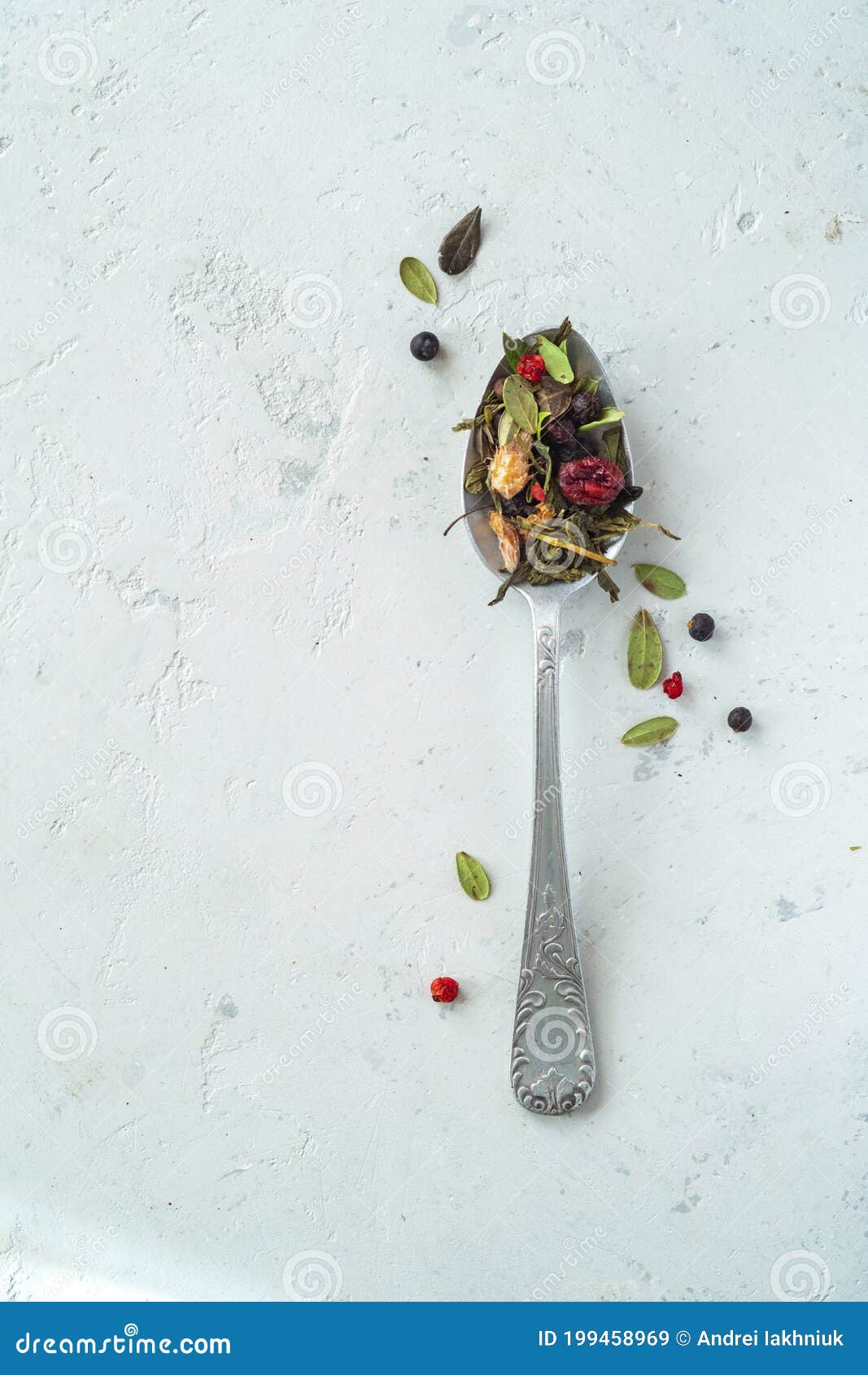 Dried Herbal Tea with Berries on a Teaspoon, Top View and Copy Space