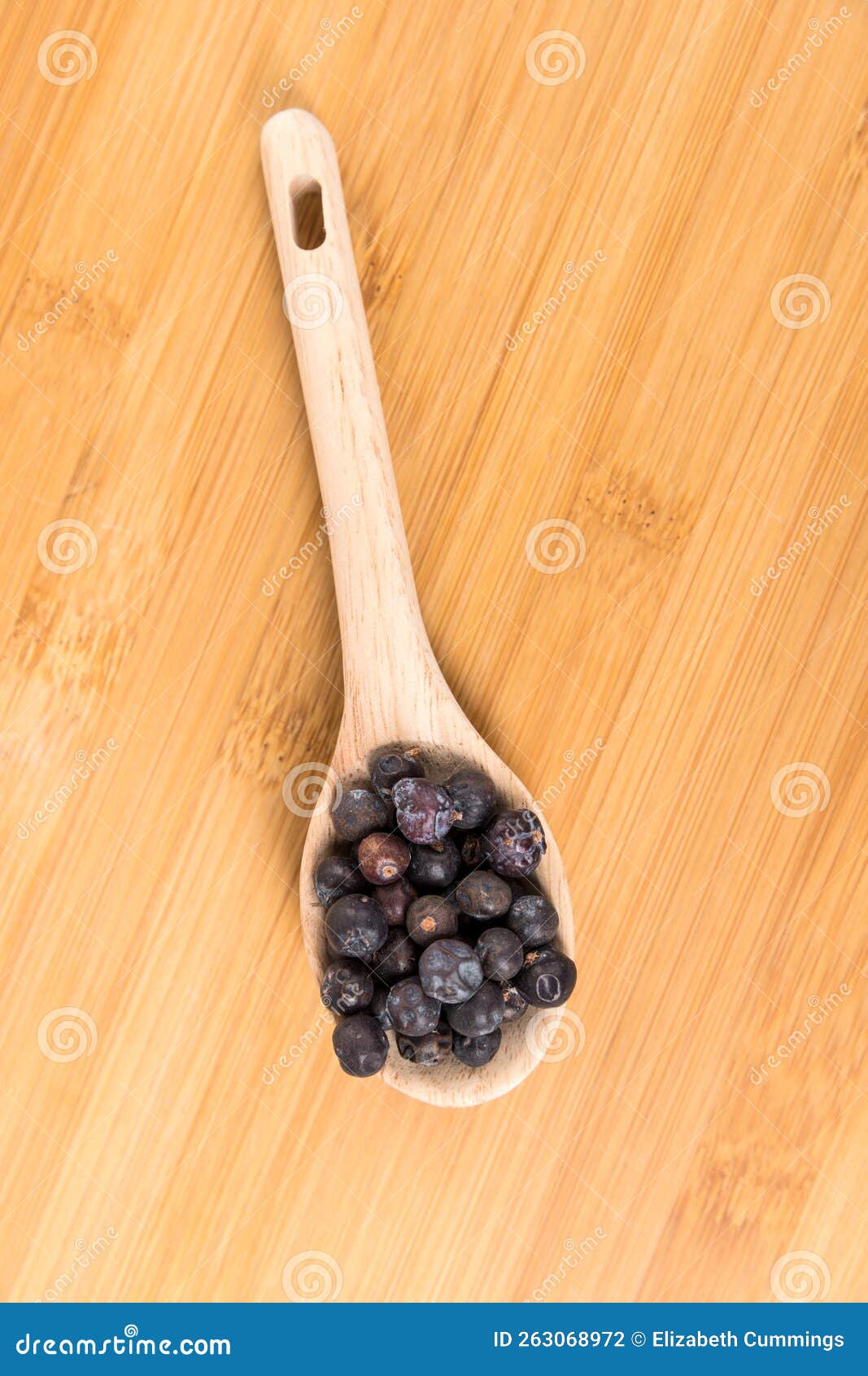 Dried Juniper Berries in a Wood Spoon Over Wood Board Top Down Stock Photo Image of juniper