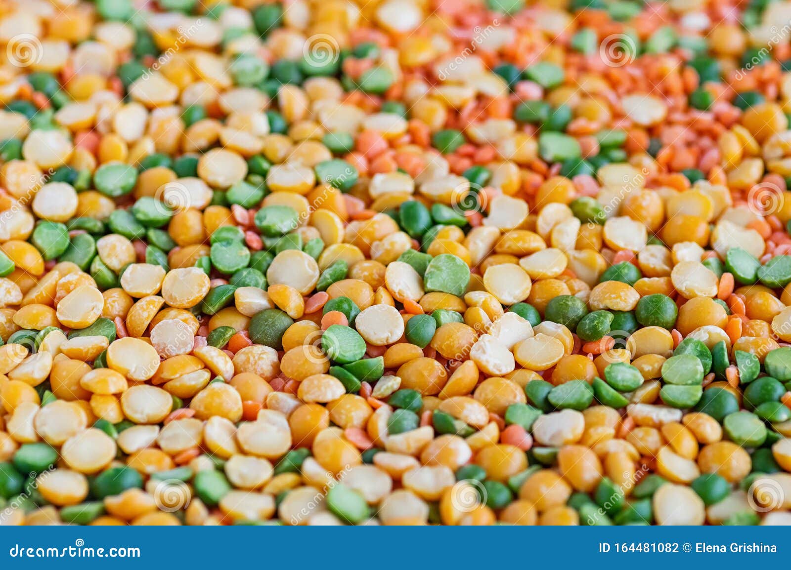 Dried Peas and Lentils Closeup. Background from a Mixture of Legumes
