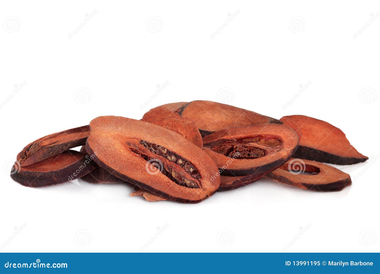 Dried quince fruit used in traditional chinese herbal medicine, isolated over white background. Mu gua. Cortex montan radicus.