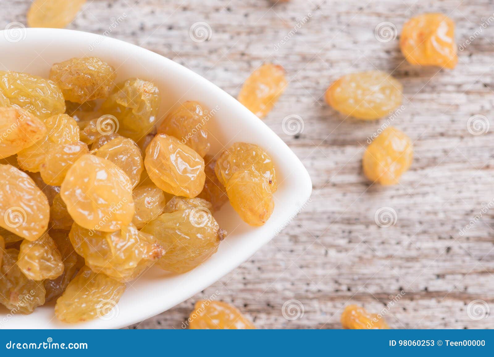 Dried Yellow Raisin Fruits On Wood Background Stock Image - Image of ...