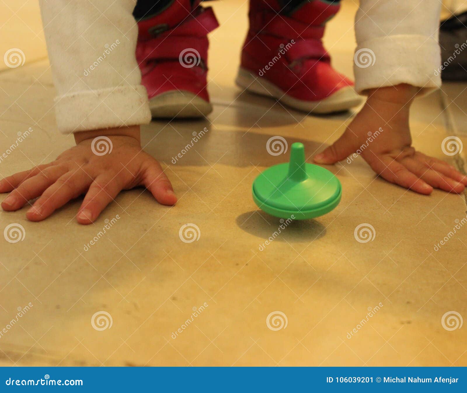 jewish traditional chanuka toy. children playing with colorful driedles.