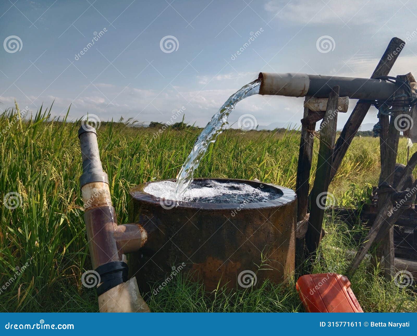 drilled wells to irrigate rice fields in rice fields during the drought season