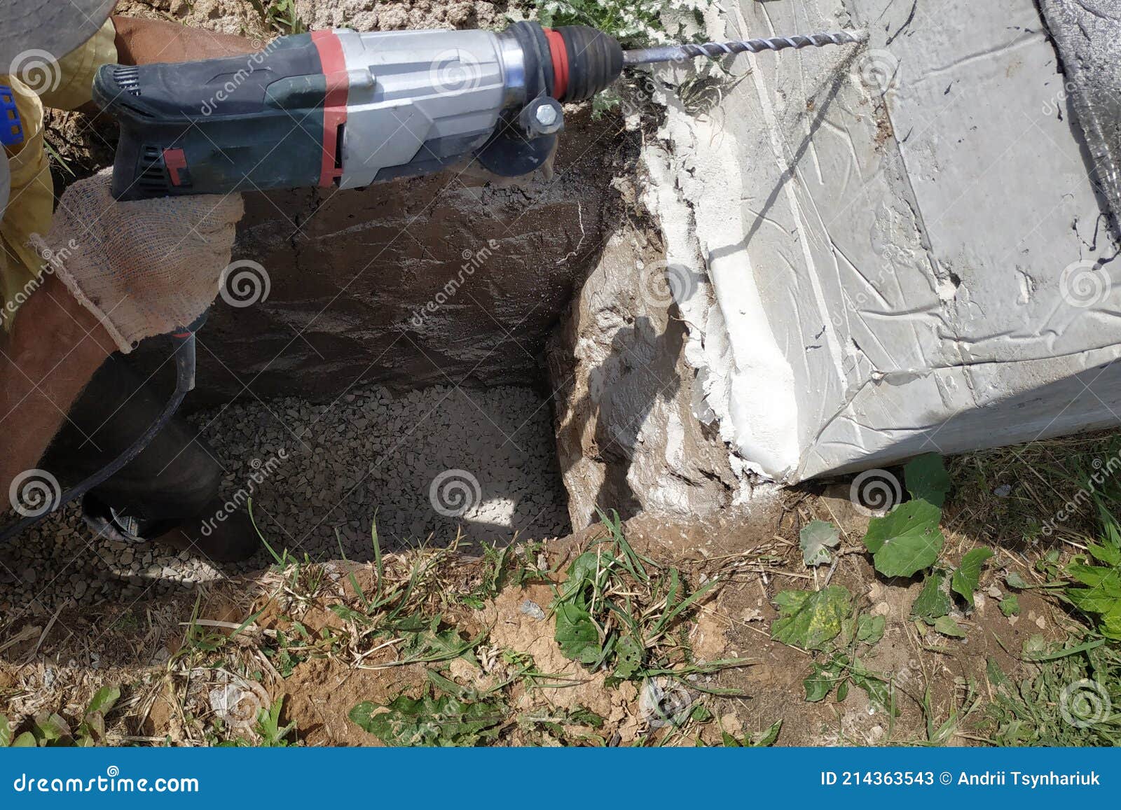 Drilling a Hole in the Concrete Wall with a Jackhammer, Perforator in Operation Stock Image