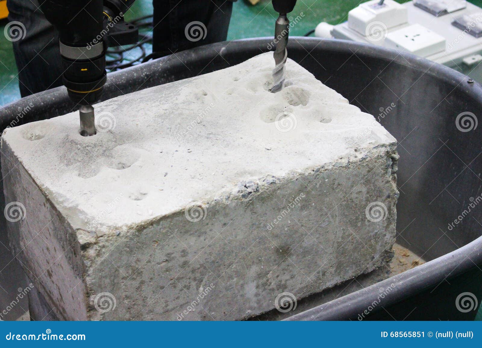 Drilling holes in concrete stock image. Image of home 68565851