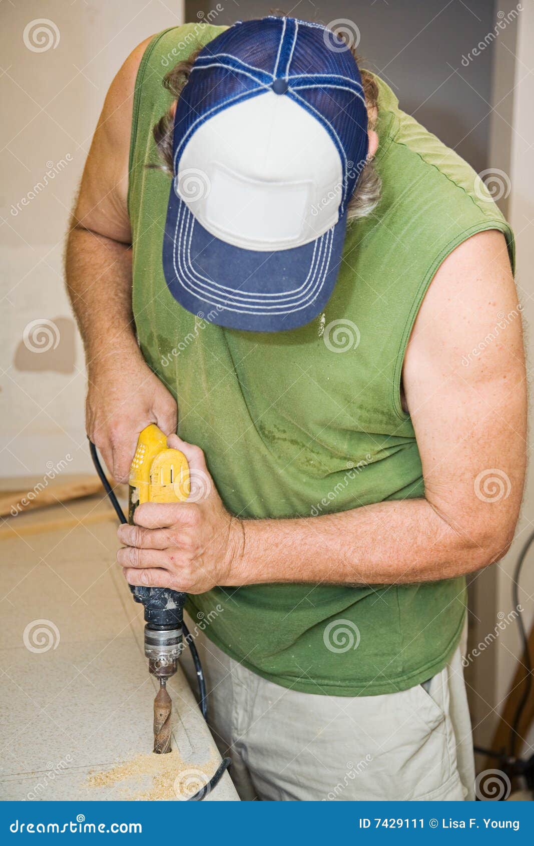 Drilling through Laminate stock image. Image of drill 7429111
