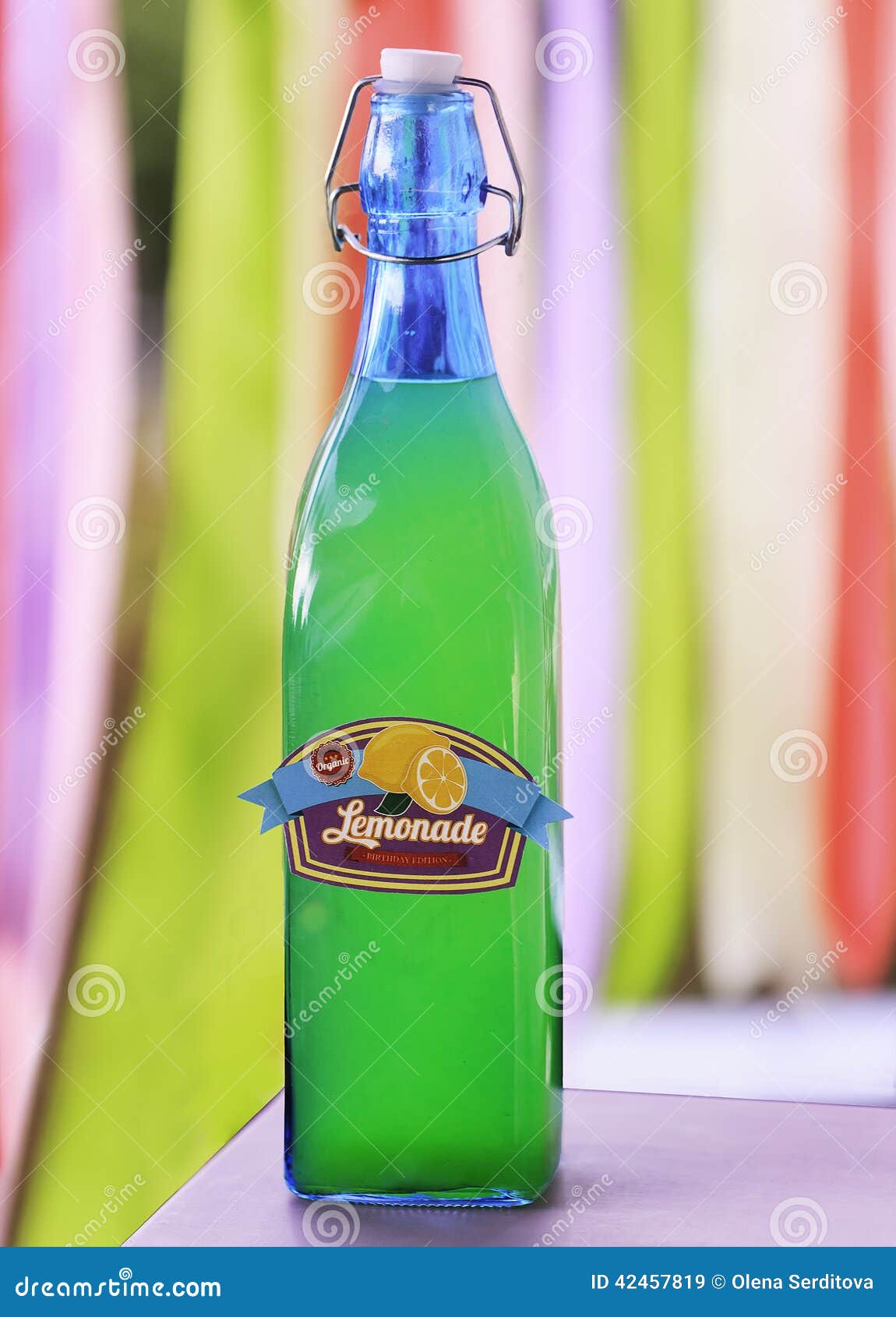 Drink in Glass Bottle on a Vivid Background Stock Image Image of