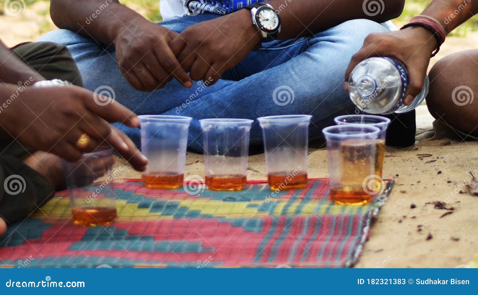 Making Pegs of Alcohol or Liquor in a Plastic Glass. Stock Image