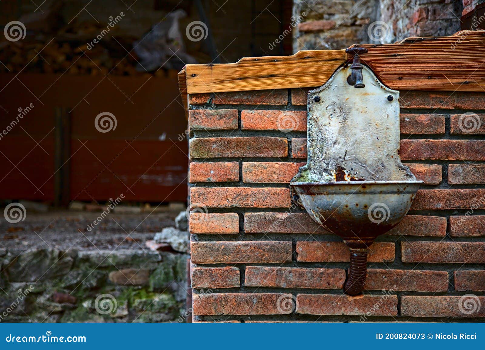 Drinking Fountain on a Brick Wall Stock Image Image of eatery, beauty