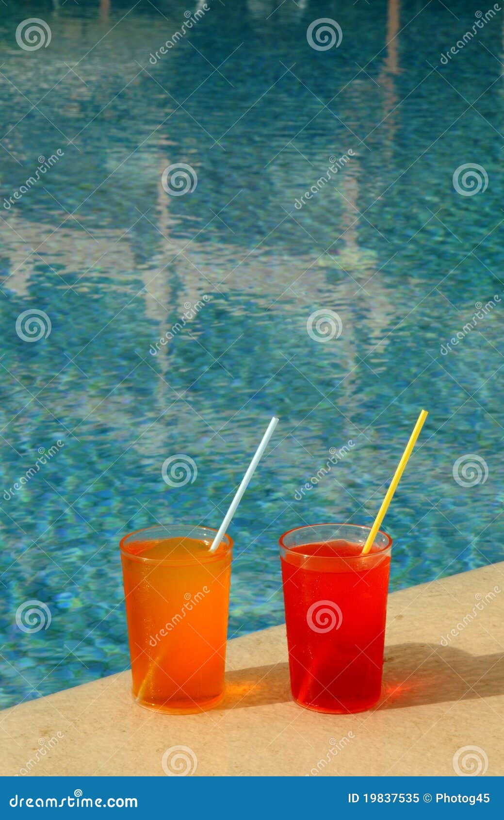 Drinking Glasses by the Pool Stock Image Image of straw, blue 19837535