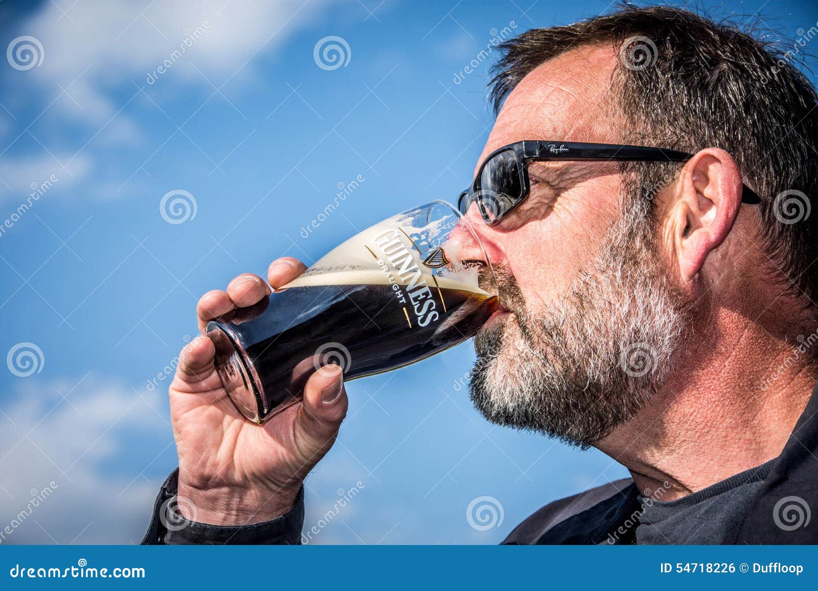 Drinking Guinness Beer editorial photo. Image of beer 54718226
